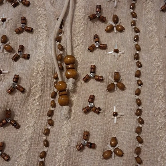 Chicos Cream Tunic Featuring Gold, Wood, And Embroidered Embelishments - Picture 8 of 8